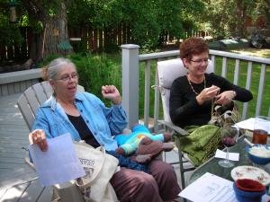 Leslie with No-Eyed Bear and Carol working on a dishcloth.