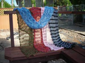 Thick and Thin scarves with Carol's blue fagotting scarf on top.