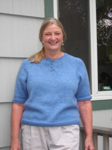 Marsha's blue Henley sweater.